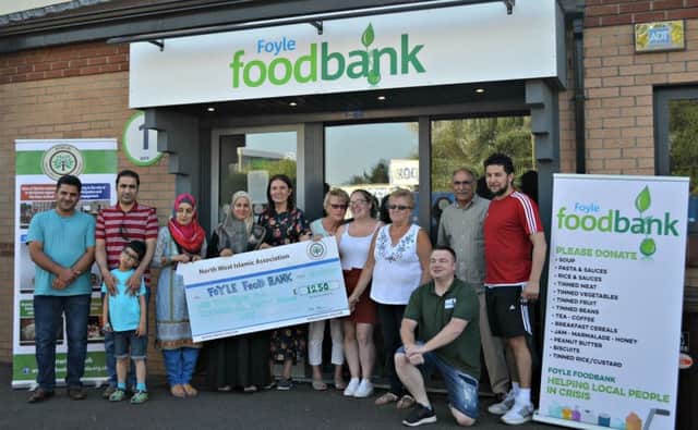 Pictured presenting the cheque to Foyle Foodbank staff are members of the North West Islamic Association