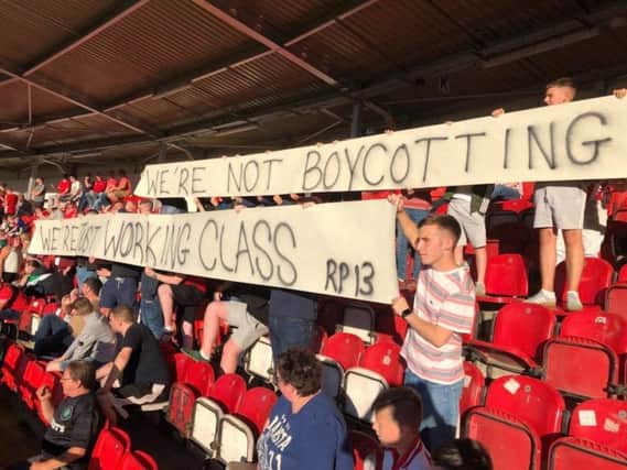Derry City supporters display a banner in reaction to the increase in Europa League ticket prices during the Limerick game on Friday night.