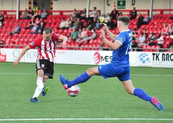 Derry City midfielder, Rory Hale strikes the post with this well hit effort.