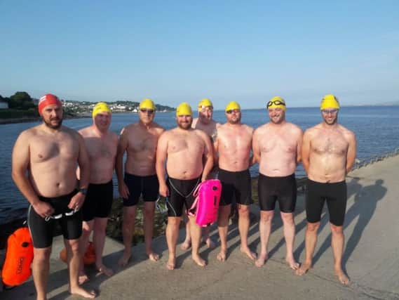 Eight of the City of Derry Swimming Club team who are taking on the North Channel.