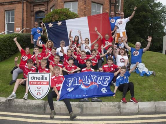 OH LA LA!. . .  French club Dragons de la Vaucouleurs and their entourage pictured at Magee College yesterday before the start of the OÃ¢Â¬"Neills Foyle Cup Parade through the city centre. (Photos: JIm McCafferty Photography)