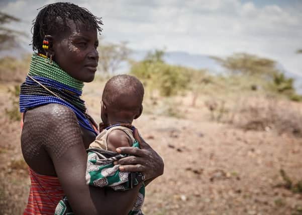 Esther Chegem and son in Central Turkana, Kenya where Trócaire responded to the drought, distributing food packages through the Diocese of Lodwar. Photo: Aidan O'Neill.