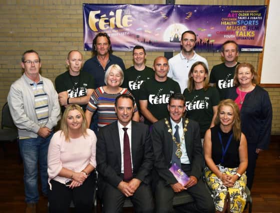 Group pictured at the launch of Feile 2018 in the Pilots Row Centre. Included are, seated from left, Karen Mullan MLA, Mark Browne, Deputy Permanent Secretary for Northern Ireland, the Mayor, Councillor John Boyle, and Maureen Fox, Urban Villages Initiative, funders. DER3018-123KM