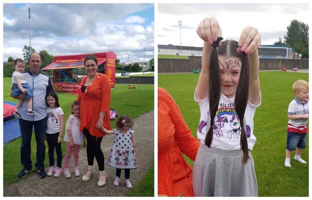 Cara pictured with her parents and sisters and (right) holding up the pigtails she will be donating.