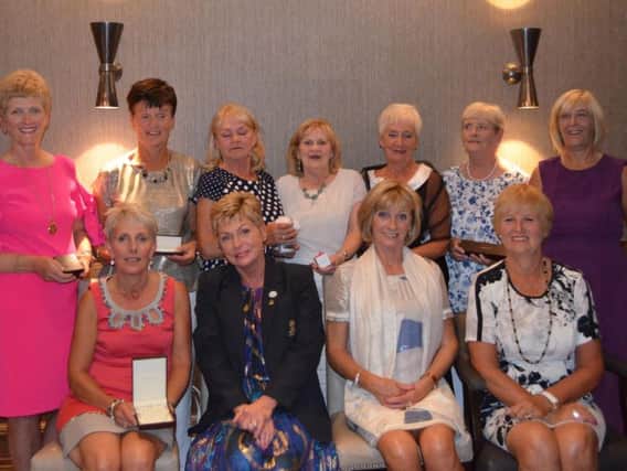 Mrs Avril Gallaghers Presidents Day Prize Winners at Foyle Golf Club. Back row from left to right: Doreen Fleming (visitor), Lorna Thompson (gross), Agnes McLaughlin (runner-up), Gaye Shaw (nearest pin), Christine McCafferty (back 9), Ann Fulton (third), Faye McGrotty (committee prize). Front row from left to right: Anne Hamilton (winner), Lady President Avril Gallagher, Lady Captain Josephine Kelly, Vice Captain Alison Evans.