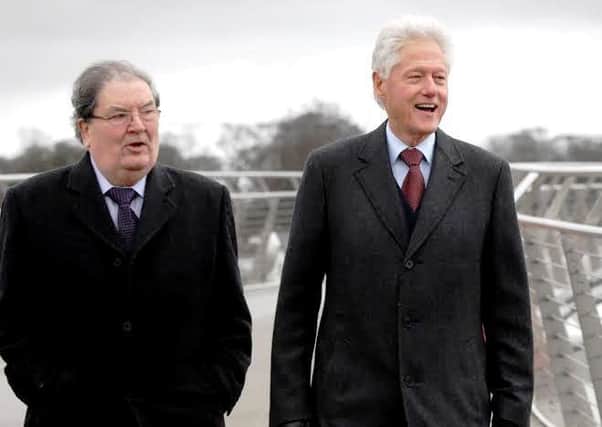 2014: John Hume with former US president Bill Clinton in Derry.