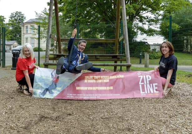 Councillor John Boyle, Mayor of Derry City and Strabane pictured launching Children in Crossfires 2018 Zipline Challenge recently at the Playtrail. The Zipline Challenge, across the Foyle, will take place on Saturday 8th September next. Included in the photograph are Children in Crossfires Eileen Warren and Shauna Taylor. DER3018GS001