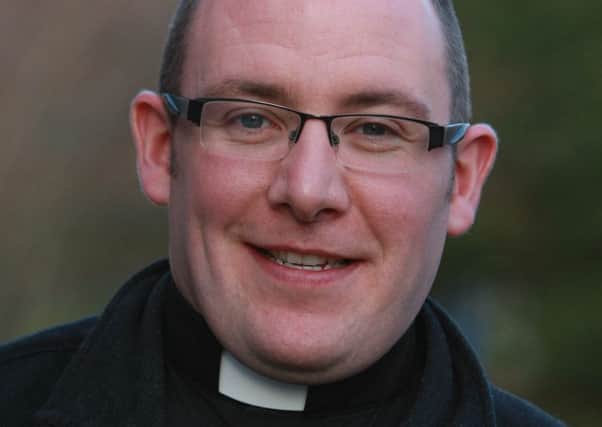 Fr. Chris Ferguson.(2502JB31)