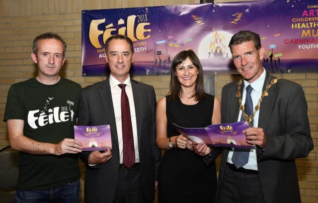 The Mayor, Councillor John Boyle pictured with, from left, Gareth Stewart, organising committee, Mark Browne, Deputy Permanent Secretary for Northern Ireland, and Linsey Farrell, Programme Director for the Urban Villages Initiative, funders, at the launch of Feile 2018 in the Pilots Row Centre. DER3018-124KM