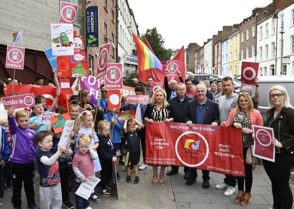 Local politicians and representatives from various Irish language groups pictured during the protest at An Culturlann yesterday. DER3118-134KM
