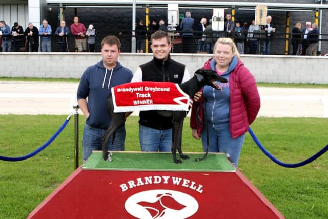 The Brandywell 300 Sprint winner, Porthall Magic pictured with, from left to right, winning owner Dylan and Kyle Porter from Co Donegal and Niamh McCrory.