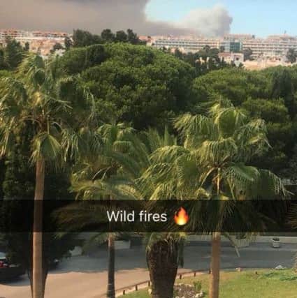Colr. Duffy's picture of the smoke clouds closing in on Albufeira.