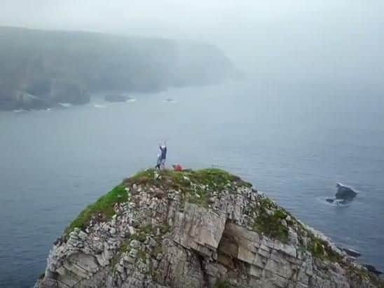 Monty Halls and his daughter Isla on top of the Realm of the Senses sea stack off the coast of Donegal.