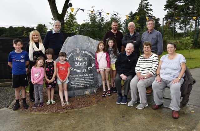Members of the McLaughlin family pictured at the unveiling of a memorial stone in the grounds of the Muff Community Park by the Muff Community Development Co-Op as a token of their thanks for the family donating the land for the facility. Included are, seated, from left, Seamus McLaughlin, Ann McLaughlin and Joanne McLaughlin, standing, Muff Community Development Co-Op members, Bridget McCallion, Vice-Chairperson, Bernard Breslin, Chairperson, Jim Grant, Park Supervisor, Liam MacLochlainn, Secretary, and Mura MacLochlainn, Manager. DER3318-122KM