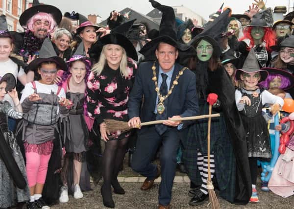 The Mayor Councillor John Boyle and Michelle Jameson from Tourism NI with some of the hundreds of witches who descended on the Walls of Derry as Derry City and Strabane District Council launched the Hallowe'en 2018 programme. (Photo: Martin McKeown/Inpresspics.com