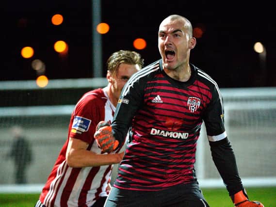 Derry City captain Gerard Doherty celebrates after his penalty save on Friday night.