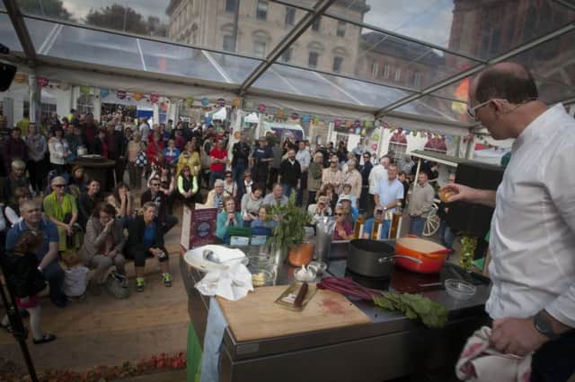 Chef Brian McDermott enthralls the crowd during a Slow Food Festival in Guildhall Square, Derry.