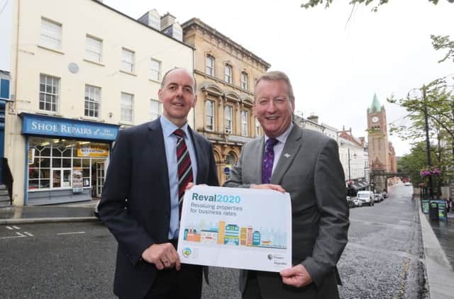 Patrick Bradley, from the North West Regional Valuation Office based in Waterside House pictured with Jim Roddy Derry city centre manager, Derry/Londonderry City Centre Initiative urging businesses in the city to return their business rates Reval2020 questionnaire