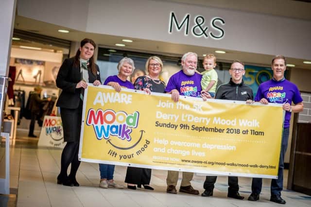 Danielle McDaid, M&S,  Margaret McCrossan from AWARE, Tanya Magee store manager, AWARE Chairperson Bernard McAnaney and his grandson Eamon Herr, Dermot Barr, M&S and Pat Lynch from AWARE.