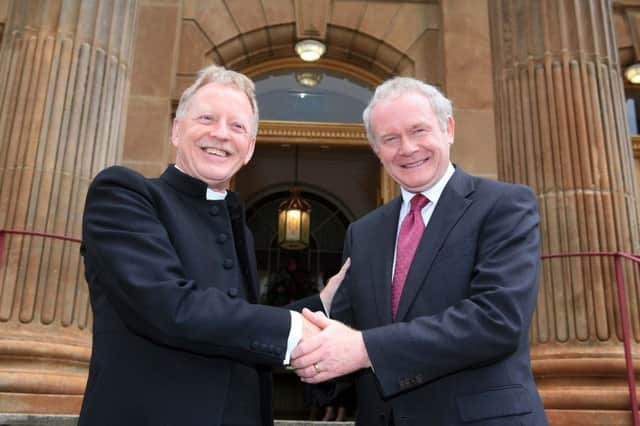 GOOD FRIENDS... Rev. David Latimer and Martin McGuinness pictured outside First Derry Presbyterian Church in 2011.