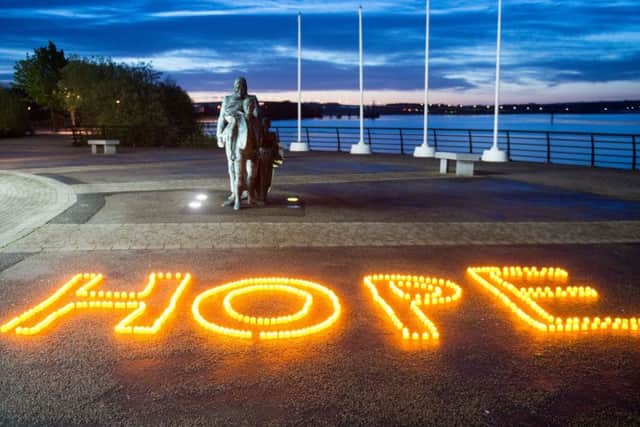Hope was the message spelt out on the quayside in Derry at the Darkness Into Light walk at dawn in Derry to raise awareness of suicide and support services. The campaign which is in itÃ¢Â¬"s 10th year raised funds for suicide and self harm charity Pieta House and partnered charities. Picture Martin McKeown.Inpresspics.com. 12.05.18