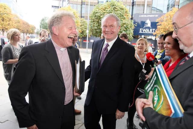 Martin McGuinness and Rev. David Latimer at the Sinn Fein Ard Fheis in 2011.