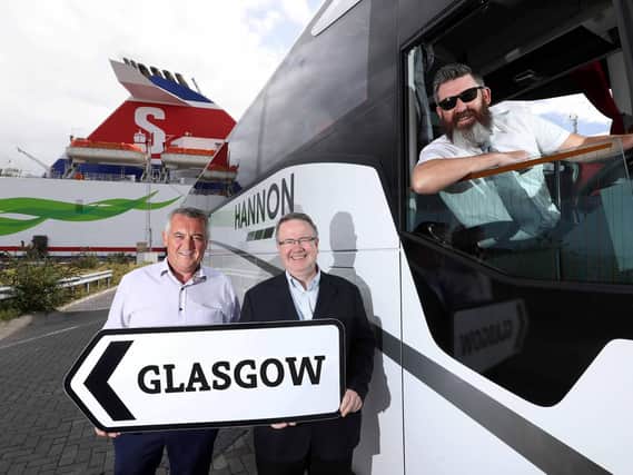 DRIVING GROWTH:  Aodh Hannon (left) of Hannon Coach has revealed plans to expand the companys direct luxury coach service between Belfast and Glasgow to other towns across Northern Ireland.  The County Armagh-based coach operator launched its Glasgow Express to and from Belfast in February this year and, following a highly successful first six months, has now submitted applications to introduce further direct services between the popular Scottish city and many of Northern Irelands main towns, including Enniskillen, Coleraine, Ballymena, Derry~Londonderry, Cookstown, Strabane and Newcastle.  Stena Lines Ian Baillie (centre) reported that the ferry company has experienced a 7.5% increase in coach traffic to Glasgow since Hannon Coach launched the Glasgow Express service which operates twice daily in both directions and is the only direct city to city through-coach service (i.e. using the same coach for the entire journey) from Northern Ireland.  Also in the picture is driver Jim McAlorum.