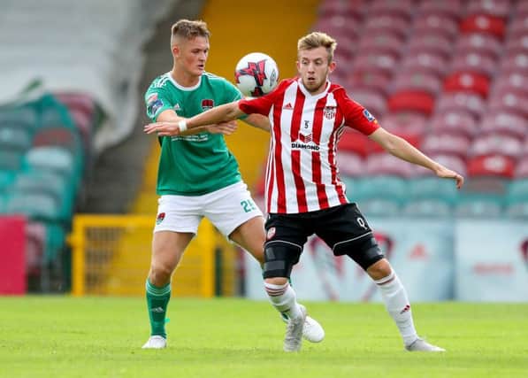 Derry City's Ally Roy, pictured here against Corks Sean McLoughlin, is hoping to hold off the might of the Spanish as Northern Ireland U21s look to keep alive hopes of qualifying for Euro 2019.