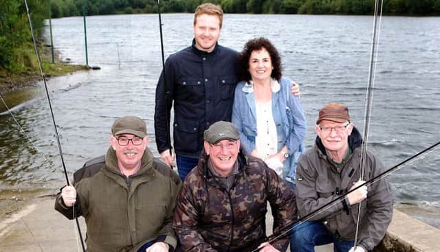 Bernie McGuinness with her son Emmett at the launch of the "Martin McGuinness Fly Fishing Competition", with from left, Sean McChrystal, Terry Crossan and William McGuinness. (Photo - Tom Heaney, nwpresspics)