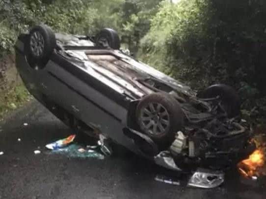 The car was discovered upside down on the road on Tuesday evening.