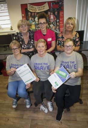 BRAVE THE SHAVE. . . .Three brave ladies. Ann Wilson, Vivienne Hockley and Donna Smith who will come under the scissors shortly in aid of MacMillan Cancer Support. The ladies are pictured with Marie Gillespie, Chair, Galliagh Womenâ¬"s Group, Michelle McLaren, Pink Ladies and Rosie Doherty, Co-Ordinator, Galliagh Womenâ¬"s Group. (Photo: Jim McCafferty Photography)