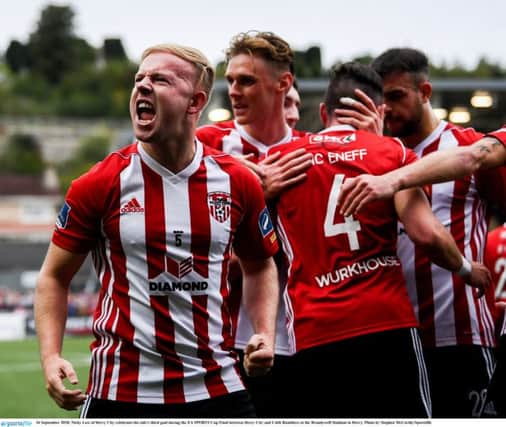 BACK IN THE GAME . . . Nicky Low of Derry City celebrates his side's third goal during the EA SPORTS Cup Final.