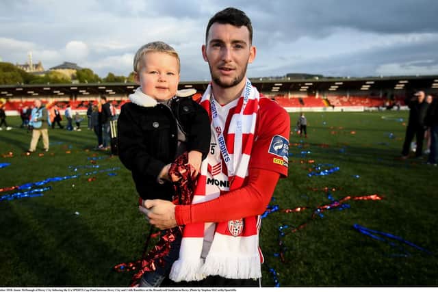 Derry City winger, Jamie McDonagh celebrates after winning the EA Sports Cup on Sunday.