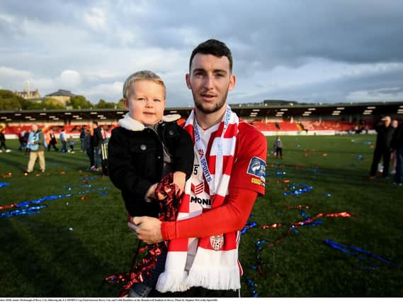 Derry City winger, Jamie McDonagh celebrates after winning the EA Sports Cup on Sunday.
