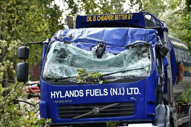 A falling tree hit an oil delivery lorry at Osborne Park in south Belfast during the heavy winds on Wednesday morning. Pic by Colm Lenaghan /Pacemaker