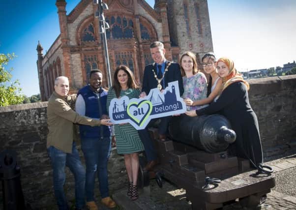WE ALL BELONG! . . . . . (L-R) Asem Sweidan, Stephan Garwe, Rekha Dromgoole, Foyle Race Equality Forum, Cllr John Boyle, Mayor of Derry City and Strabane District Council, Cllr Caoimhe McKnight, Chair of the PEACE IV Board, Anna Zhou, and Rabia Kar, North West Islamic Association at the launch of the WE ALL BELONG campaign at the Guildhall. The campaign, which is funded through the SEUPBÃ¢Â¬"s PEACE IV initiative, will run for the next two years and is dedicated to tackling prejudice and hate crime in all its forms.