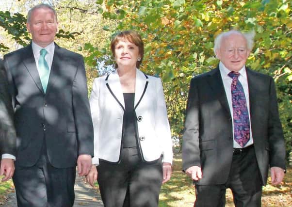 Martin McGuinness, Dana and the current President of Ireland, Michael D. Higgins, during the 2011 campaign.