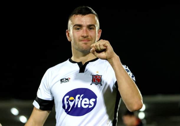 Dundalk's Michael Duffy celebrates after victory over Cork City at Turner's Cross.