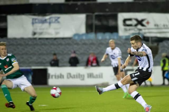 Patrick McEleney curls his shot into the corner of the net in the first half to make it 2-0