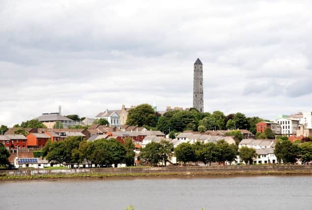 IMPRESSIVE... A computer generated image of the medieval round tower superimposed on the modern Derry skyline.