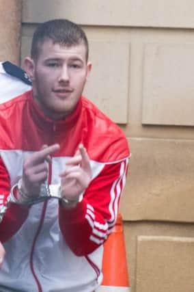 Pacemaker Press 30-12-2015: Dean Beattie (22 )who  was previously filmed escaping from Bishops Street Courthouse in Londonderry pictured following his rearrest and appearance at the same court in Northern Ireland. 
Picture By: Pacemaker.