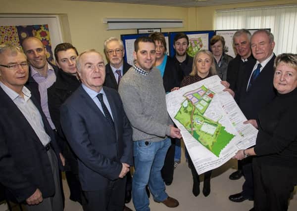 The late Deputy First Minister, Martin Mc Guinness back in 2016 meeting with key stakeholders at HIllcrest Trust to discuss the Top of the Hill Masterplan, which included the new community centre facility.