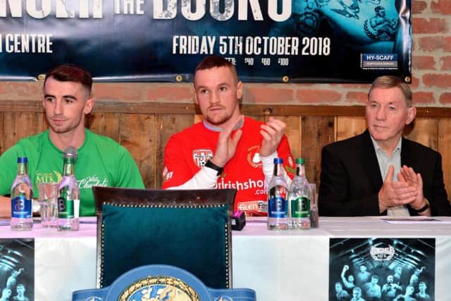 Tyrone McCullagh, Sean McGlinchey and former EBU European lightweight champion, Charlie Nash attend the Danger at the Docks Press Conference in Derry on Tuesday.