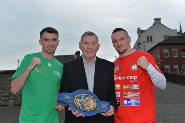 Derry boxers Tyrone McCullagh and Sean McGlinchey pictured with Charlie Nash and his EBU belt after the Danger at the Docks boxing bill press conference held at the Bentley on Tuesday afternoon last. DER4018GS010