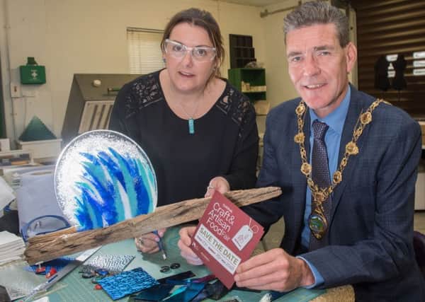 Derry City and Strabane District Council Mayor, Councillor John Boyle pictured with glass artist Natasha in her Eglinton studio ahead of this years Guildhall Craft and Artisan Food Fair which is taking place from the 23rd until the 25th of November 2018. Picture Martin McKeown. Inpresspics.com.
