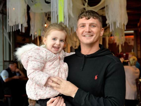 Connor Coyle pictured with his daughter Clodagh Rose at the Danger at the Docks boxing bill press conference held at the Bentley on Tuesday afternoon last. DER4018GS008