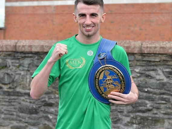 Derry's Tyrone McCullagh pictured with Charlie Nash's EBU European belt, is confident he'll have one of his own on Friday night.