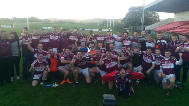 Banagher players and supporters celebrate winning the Derry Intermediate title at Owenbeg on Saturday.