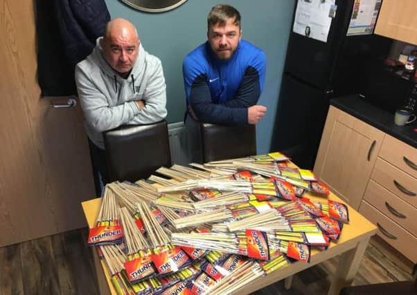Activists pictured with some of the fireworks seized locally.