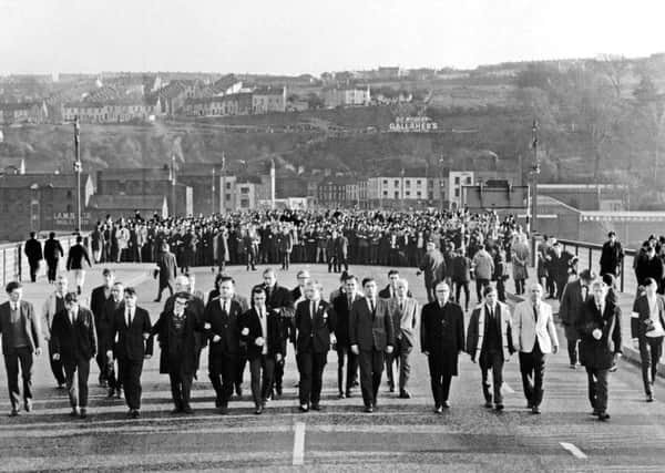 Civil rights march on its way across the Craigavon Bridge, Derry, N Ireland, UK, on 2 November 1968.